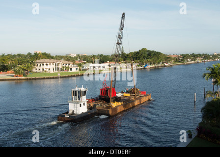 Pile driver barge on Intracoastal waterway Stock Photo - Alamy