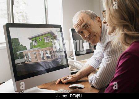 Woodstock New York USA Architects discussing green construction project Stock Photo