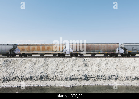 Bonneville Salt Flats Utah USA goods train in the desert on railway tracks Stock Photo