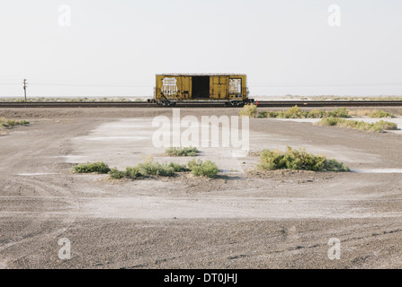 Utah USA empty box car freight wagon on train tracks desert Stock Photo