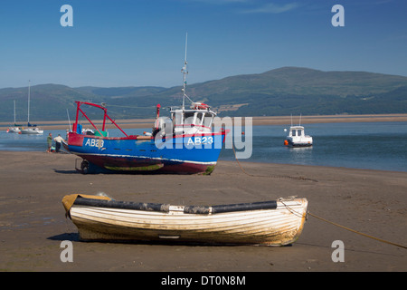 Aberdovey Aberdyfi fishing boats on estuary beach at low tide Plynlmon in background Gwynedd Mid Wales UK Stock Photo