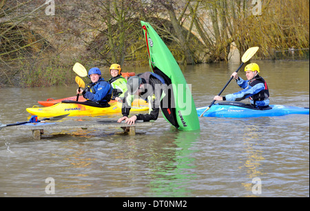 members of the isis  canoe club makeing the best of the flooding  at port meadow oxford Flooding at port meadow oxford 25/11/12 Stock Photo