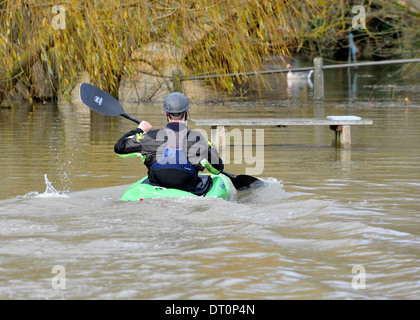 members of the isis  canoe club makeing the best of the flooding  at port meadow oxford Flooding at port meadow oxford 25/11/12 Stock Photo