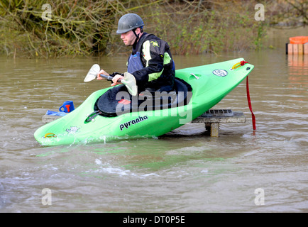 members of the isis  canoe club makeing the best of the flooding  at port meadow oxford Flooding at port meadow oxford 25/11/12 Stock Photo