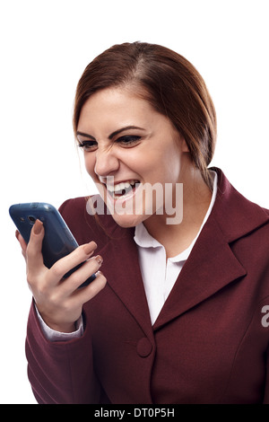 Portrait of angry businesswoman holding a cell phone and screaming into it, isolated on white background Stock Photo