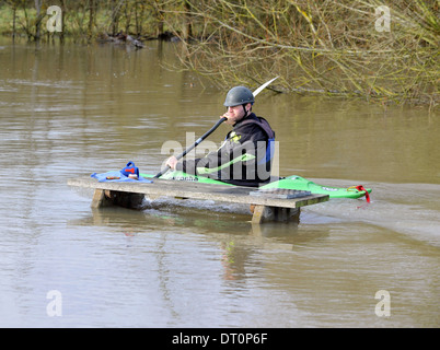 members of the isis  canoe club makeing the best of the flooding  at port meadow oxford Flooding at port meadow oxford 25/11/12 Stock Photo