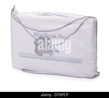 An Apple MacBook Pro laptop inside a retail carrier bag Stock Photo