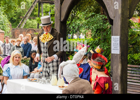 Actors performing in the Mad Hatters Tea Party at Blists Hill Victorian Town museum Telford Stock Photo