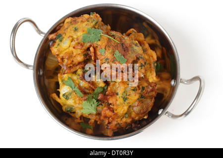 Homemade onion bhaji Indian appetisers in a kadai serving bowl, seen from above Stock Photo