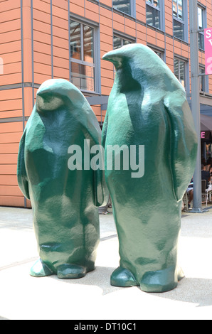 Statues of a pair of green penguins, cité internationale, The International City, Lyon, France Stock Photo