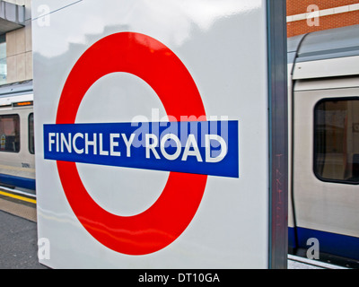 Roundel at Finchley Road Underground Station platform, London, England, United Kingdom Stock Photo