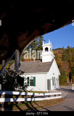 Covered bridge (1862) and its neighboring Stark Union Church (1853) bring artists and photographers to Stark, New Hampshire. Stock Photo