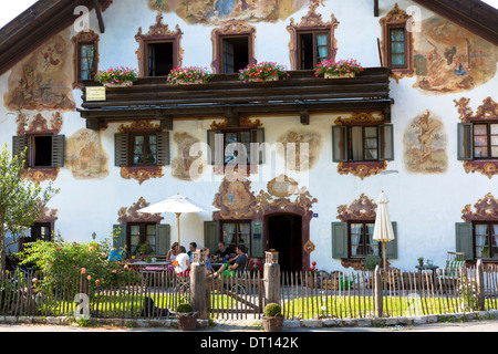 Religious painting on Beim Kirchenbauer pension and wine estate in village of Oberammergau in Upper Bavaria, Germany Stock Photo