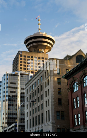 Harbour Centre tower among modern and heritage buildings in Vancouver, British Columbia, Canada.  A popular tourist attraction. Stock Photo