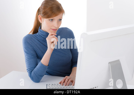 Modern office - young business woman work Stock Photo