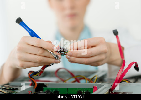 Female support computer engineer - woman repair Stock Photo - Alamy