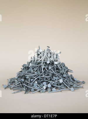 heaped pile of galvanized nails Stock Photo