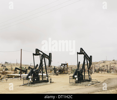 Oil rigs and wells in the Midway-Sunset shale oil fields the largest in California Stock Photo