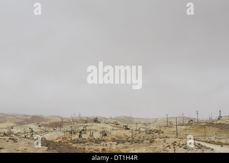 Oil rigs and wells in the Midway-Sunset shale oil fields the largest in California Stock Photo