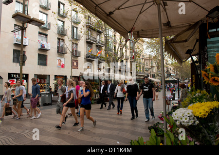 People walking along Las Ramblas in Barcelona, Catalonia, Spain, Europe Stock Photo