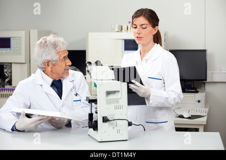 Scientists Working In Medical Laboratory Stock Photo