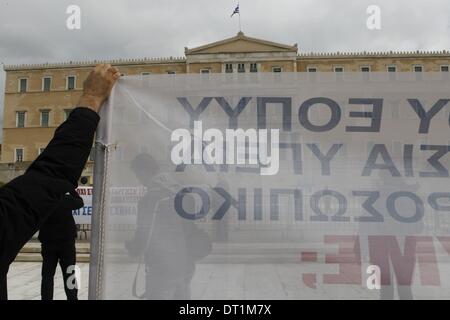 Athens, Greece. 6th Feb, 2014. State hospital doctors, nurses, dentists and employees of the country's main healthcare provider EOPYY protest in the center of Athens against troika-imposed plan to streamline the primary healthcare sector as the blueprint goes to a vote in Parliament. Unionists representing the healthcare workers argue that the reforms will ''destroy'' the Greek healthcare sector and lead to indescribable difficulties for patients Credit:  Aristidis Vafeiadakis/ZUMAPRESS.com/Alamy Live News Stock Photo