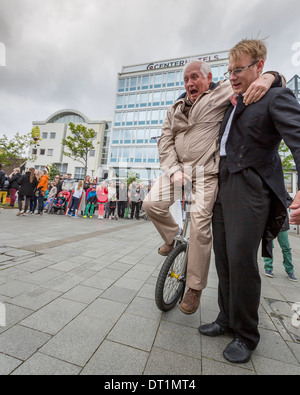 Learning to use a unicycle. Celebrating June 17th, Iceland's Independence day, Reykjavik Stock Photo
