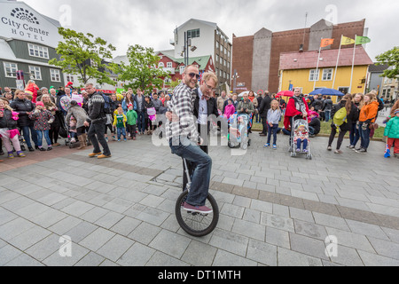 Learning to use a unicycle. Celebrating June 17th, Iceland's Independence day, Reykjavik Stock Photo