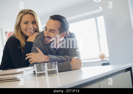 Couple at home in modern kitchen Stock Photo