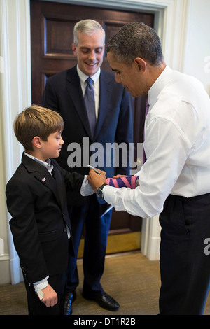 President Barack Obama Signs The Cast On Chief Of Staff Denis McDonough ...