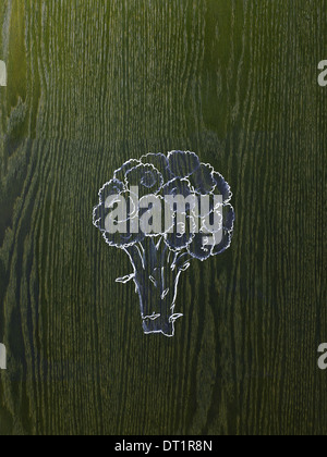 A line drawing image on a natural wood grain background A head of broccoli florets and stem Stock Photo