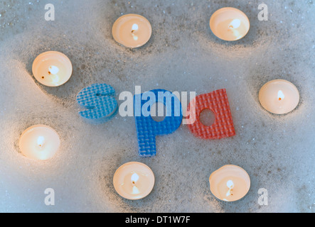 Spa letters with candles abstract Stock Photo