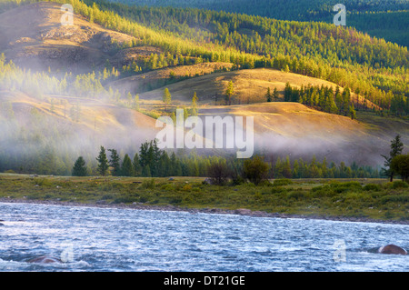 Morning fog on river Shishged in northern Mongolia Stock Photo