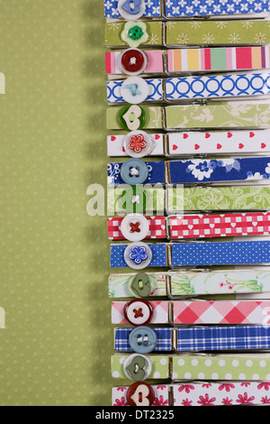 Decorative peg pattern on a green spotty background. Stock Photo