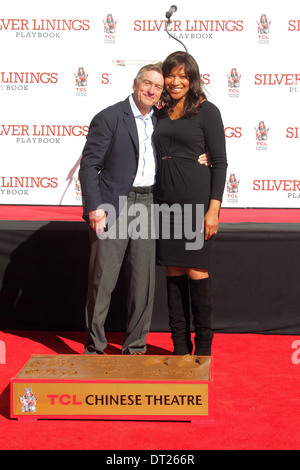 Robert De Niro, Grace Hightower at the Robert De Niro Hand and Foot Print Ceremony, Chinese Theater, Hollywood, CA 02-04-13 Stock Photo