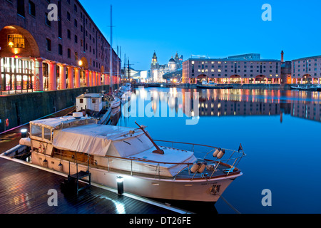 The Albert Dock at Night, with the Liver Building behind, Liverpool, Merseyside, England, UK Stock Photo