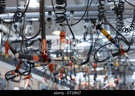 Mercedes-AMG GmbH engine production factory in Affalterbach in Bavaria, Germany - precision tools suspended from ceiling Stock Photo