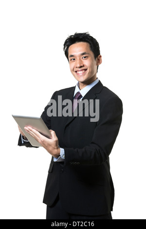 Chinese businessman with a tablet computer. Isolated on a white background. Stock Photo