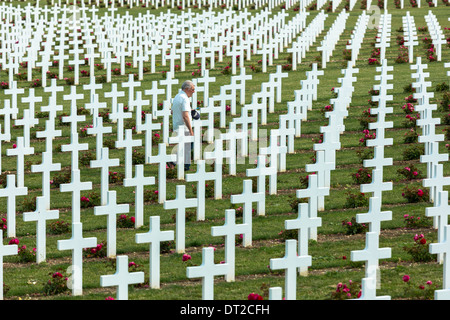 Man visiting World War 1 graves in Cemetery of Douaumont at the Ossuary at Fleury-devant-Douaumont near Verdun, France Stock Photo