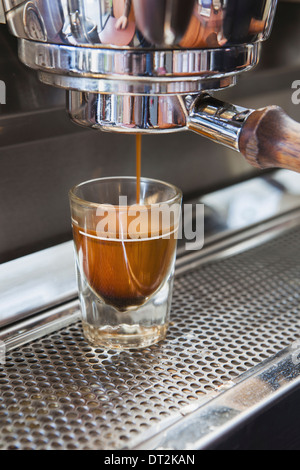 Espresso shot being poured from espresso machine Seattle Stock Photo