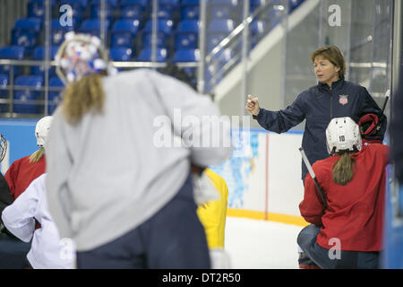 Sochi, Russia. 6th Feb, 2014. Head Coach KATHLEEN STONE discusses strategy with the team at the USA Women's Ice Hockey team photos and practice during the 2014 Sochi Winter Olympics. Credit:  Jeff Cable/ZUMAPRESS.com/Alamy Live News Stock Photo