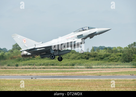 British Royal Air Force Eurofighter FGR4 Typhoon multi role fighter jet takes off from Fairford to take part in the 2013 RIAT Stock Photo