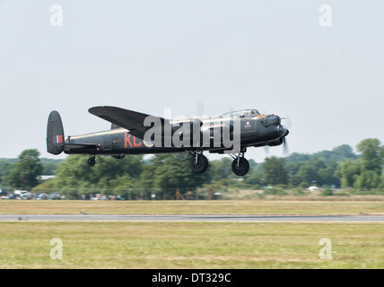 Avro Lancaster of the Battle of Britain Memorial flight takes off to display at the 2013 Royal International Air Tattoo. Stock Photo