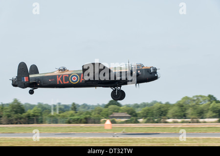 Avro Lancaster of the Battle of Britain Memorial flight takes off to display at the 2013 Royal International Air Tattoo. Stock Photo