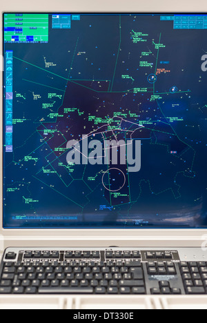 Computer monitors in the air traffic control centre of 'Skyguide' show flight paths of aircrafts in Switzerland's busy airspace Stock Photo
