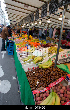 Aligre outdoor food market, busy fruit and vegetables outdoor market at the square of Aligre and street, rue Aligre. Paris, France. Stock Photo