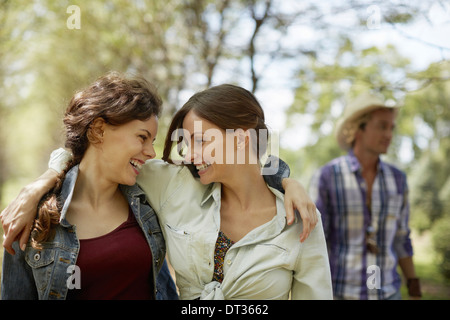 Two friends smiling at each other Stock Photo