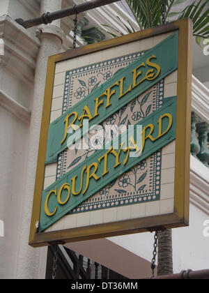 Sign for the shopping precint of the Raffles Courtyard at the legendary Raffles Hotel, Singapore Stock Photo