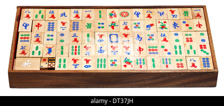 set of wooden mahjong game tiles in box isolated on white background Stock Photo