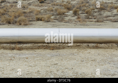 Elevated steam pipeline in the Midway-Sunset oil fields, the largest shale oil field in California. Stock Photo